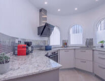 a kitchen with a sink and a window